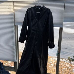 Black Long Leather Coat that zippers half down and open slit leg stunning!